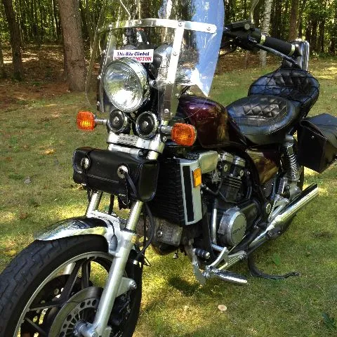 a motorcycle parked on the grass