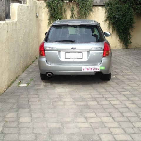 a car parked on the side of a building