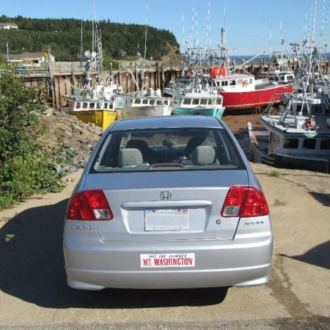 a car parked on the side of a road