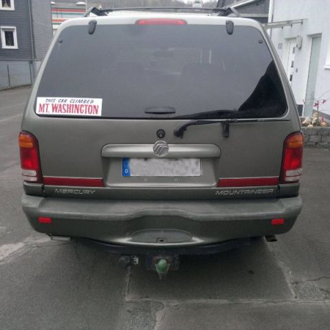 a car parked on the side of a road