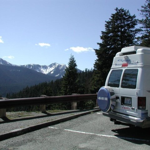 a train is parked on the side of a road
