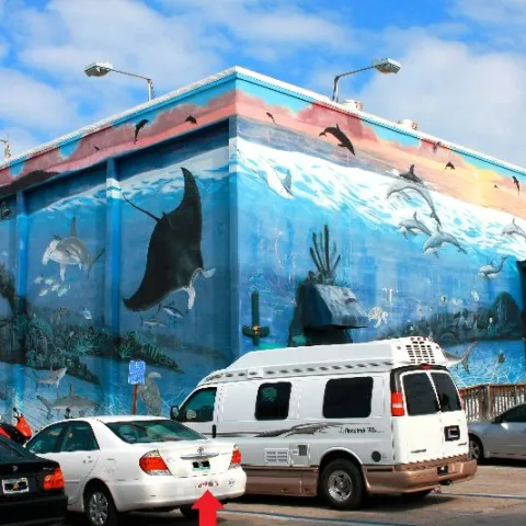 a car parked in front of a building
