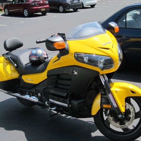 a motorcycle parked on the side of a road