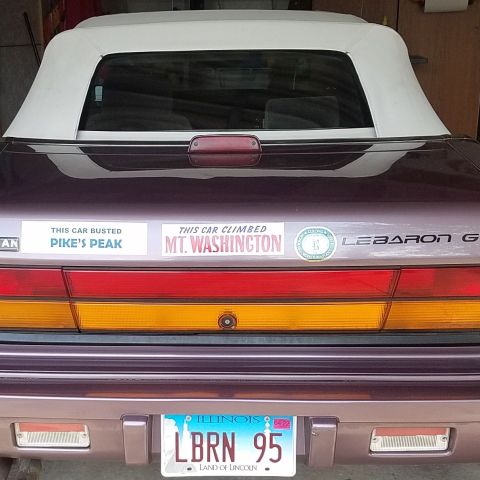 a car parked in front of a building