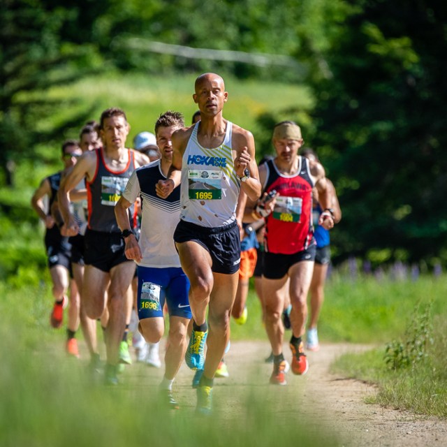 Glenn Helder et al. that are standing in the grass