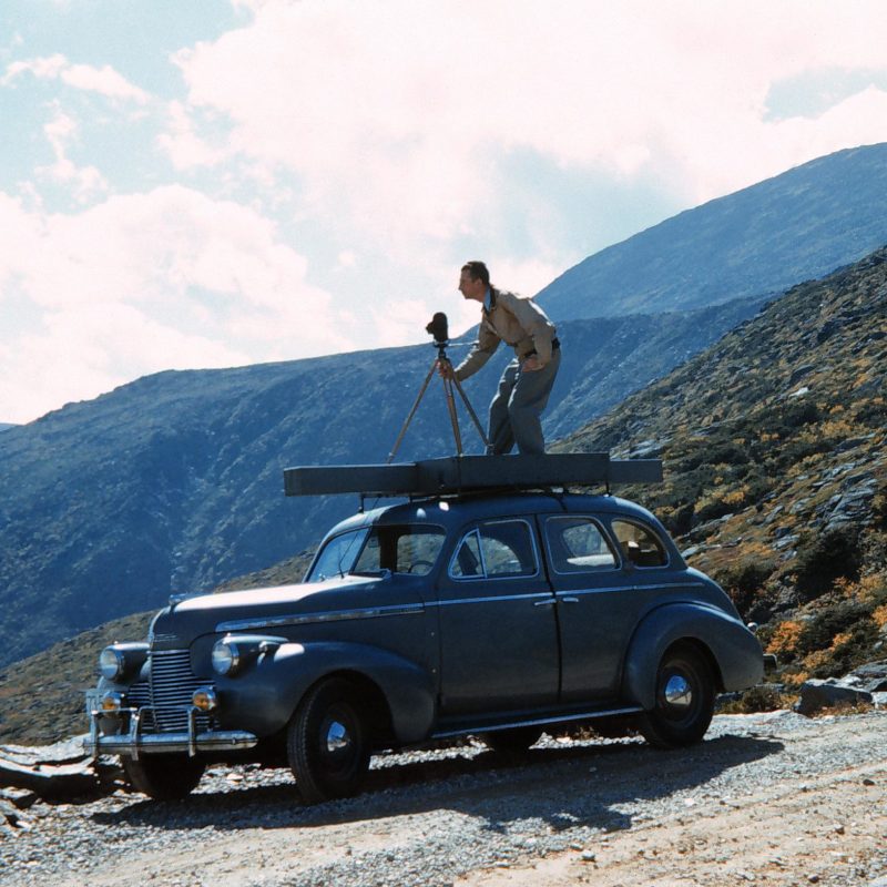 a man standing on top of a mountain