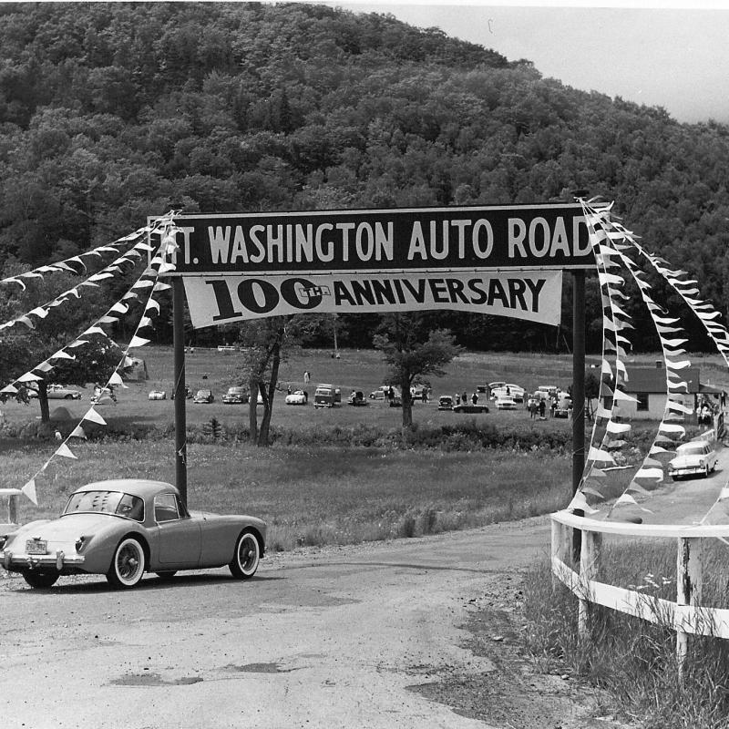 a sign on the side of a road