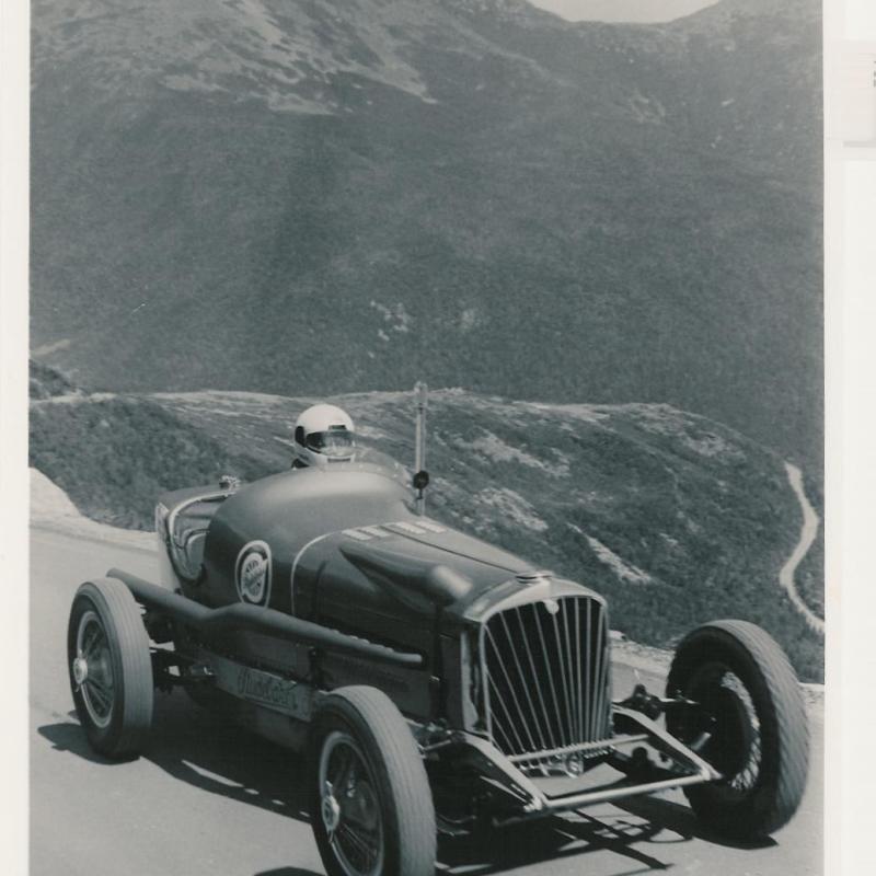 a car parked on the side of a mountain
