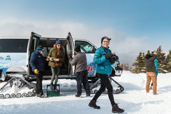 a group of people that are standing in the snow